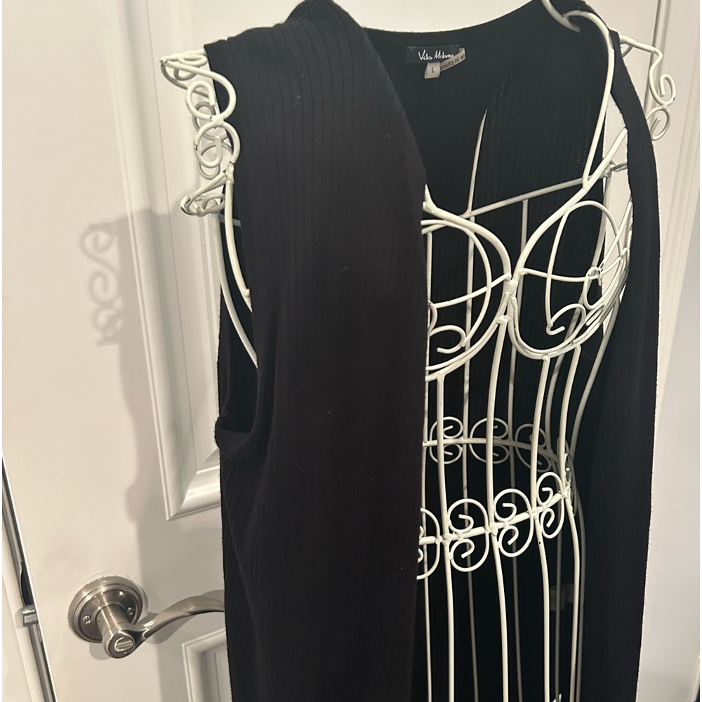 Woman’s long black sweater vest size large